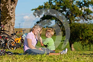 Family on getaway with bikes photo