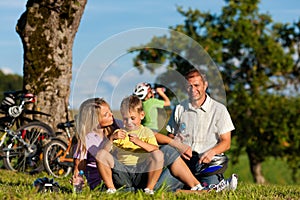 Family on getaway with bikes