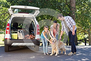 Family getting ready to go on road trip