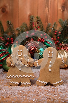 Family of Gingerbreads with 2 kids on Holiday Christmas Background