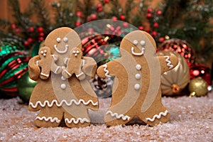 Family of Gingerbreads with 2 kids on Holiday Christmas Background