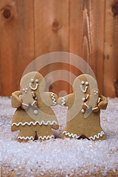 Family of Gingerbreads with 2 kids on Holiday Christmas Background