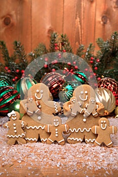 Family of Gingerbreads with 6 kids on Holiday Christmas Background