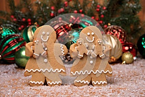 Family of Gingerbreads with kids on Holiday Christmas Background