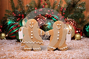 Family of Gingerbreads with kids on Holiday Christmas Background