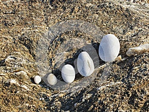 Family of give stones aligned