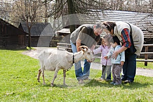 Family with goat