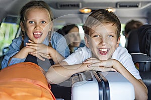 Family going on a holiday by car