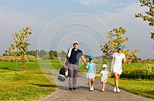 Family of golf players