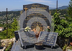 Family grave with cross bearing Jesus in the cemetery in Saint Paul-De-Vence, Provence, France