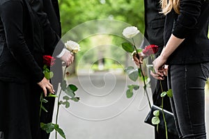 Family in guard of honor at funeral photo