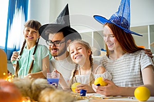 Family at a halloween table