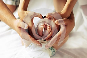 Family hands of his father, mother and scildren