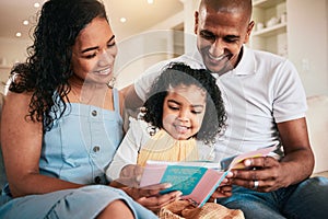 Family, happy and child reading story book, cartoon comic books and bonding with mother, father or parents at home. Love