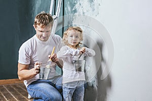 Family, happy daughter with dad doing home repair, paint walls,