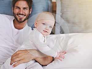 Family, happy and father with baby in bedroom for bonding, relationship and care for parenting. Love, portrait and dad