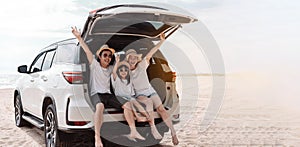 Family happy traveling enjoy in vacation with Car travel driving road trip summer vacation in car in the sunset, Dad, mom and