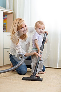 Family have fun with cleaning carpeting -