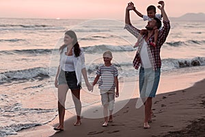 Family have fun and live healthy lifestyle on beach. Selective focus