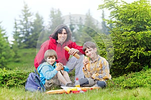 Family have got pic nic in forest photo