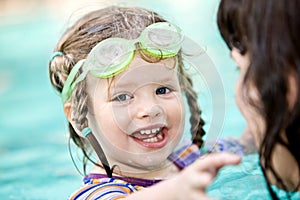 Family have rest in swimming pool.