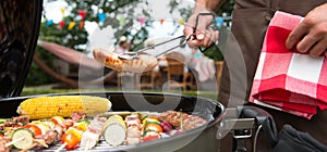 Family having a barbecue party in their garden