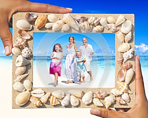 Family having fun on the beach