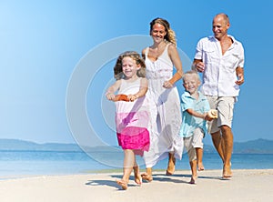 Family having fun on the beach