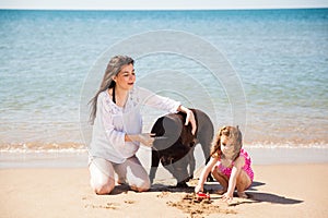 Family having fun at the beach