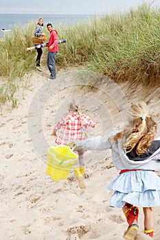 Family having fun on beach vacation