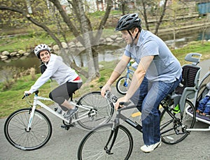 Family having fun on bikes