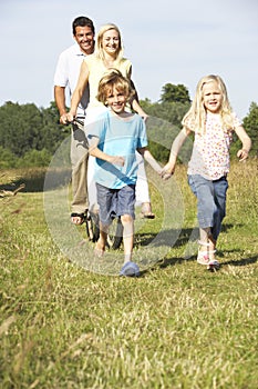 Family having fun in countryside