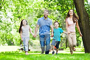 Family Having Fun In Park