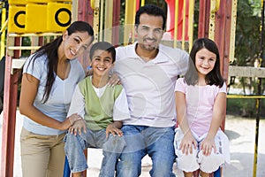 Family having fun in playground