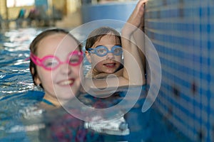 Family having fun in pool