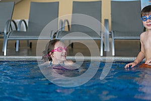 Family having fun in pool