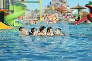 Family having fun in pool