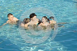 Family having fun in pool