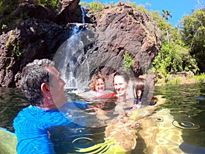 Family having fun at  Wangi Falls Northern Territory of Australia