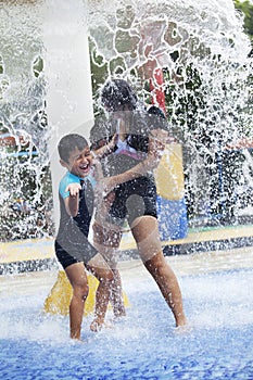 Family having fun in water park