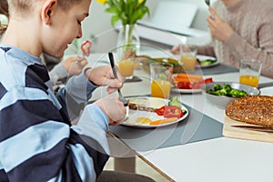 Family having healthy breakfast at home