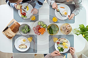 Family having healthy breakfast at home