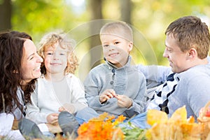 Family having picnic in autumn