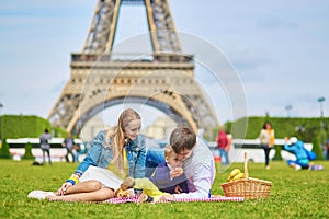Family having picnic in Paris