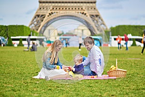 Family having picnic in Paris
