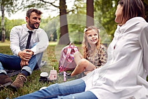 Family having a picnic after school