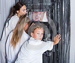 Family is helping dad and girl get out of the locked door