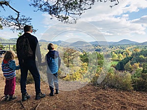 Family hike in autumn forest in Rheinland Pfalz photo