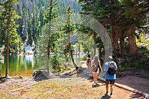 Family hiking in Colorado mountains.