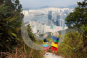 Family hiking in Hong Kong mountains